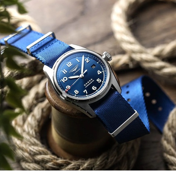 Longines 
Blue nato strap
$160 new - Picture 1 of 16
